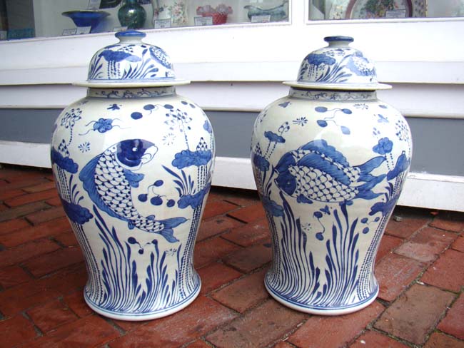 An attractive pair of    Chinese Temple Jars in Koi fish motif, 20th century